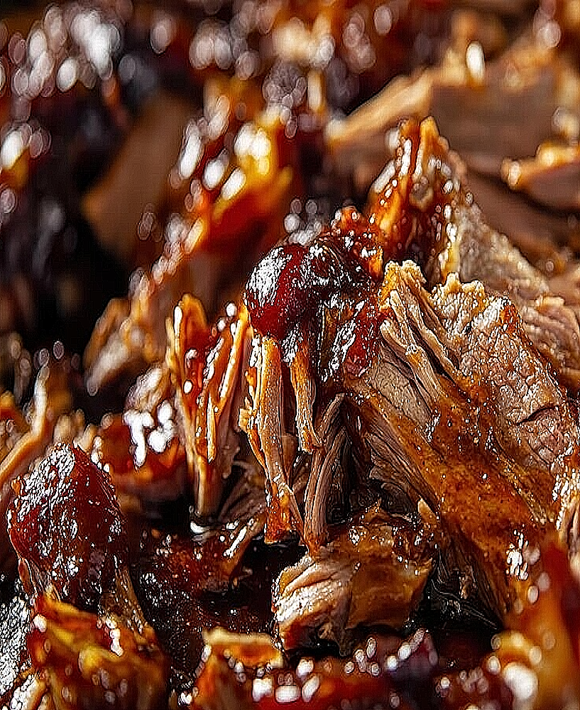 Recette d’effiloché de porc confit à l’américaine, mijoté lentement au barbecue avec bière et sirop d’érable